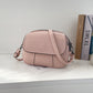 Kleine, runde Mini-Tasche aus PU