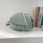 Kleine, runde Mini-Tasche aus PU